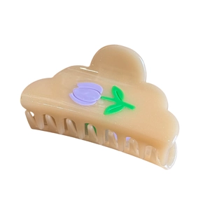 Cloud-shaped hair claw clip in cream resin with purple tulip floral patterns