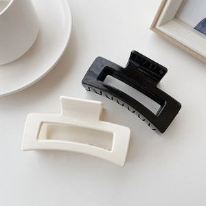 Pinces à cheveux rectangulaires de 8,5 cm noires et crème pour un coiffage élégant