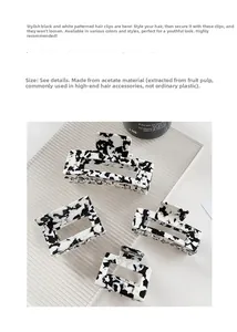 Set di quattro mollette per capelli in acetato con motivo marmoreo nero e bianco