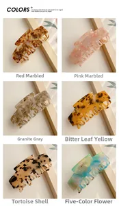 Detailed grid view of six large marble pattern hair claws in various vintage colors