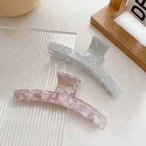 Eleganti mollette per capelli in acetato tartarugato nei colori blu e rosa effetto marmo