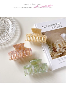 Three-piece acetate claw clip set with marble patterns in yellow, pink and green