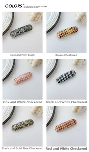 Detail showing six rectangular acetate hair clips in leopard print and plaid patterns