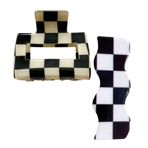Classic black and white checkered hair claw and wavy clip set in minimalist style