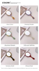 Detail view of retro acetate handheld mirrors with marble patterns in six elegant colors