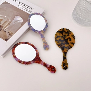 Portable oval acetate handheld makeup mirror in stylish tortoiseshell and marble patterns