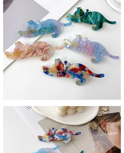 Detailed view of cute acetate cat hair clips in various marble and gradient patterns