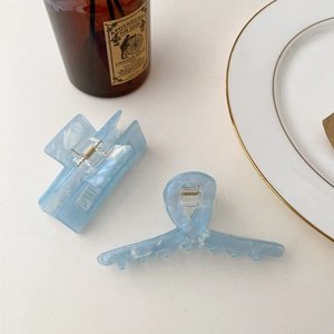 Elegant light blue acetate shark hair clips in hollow rectangular and crisscross designs