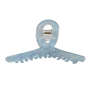Light blue marble acetate claw clip with circular cross design and metal spring for women