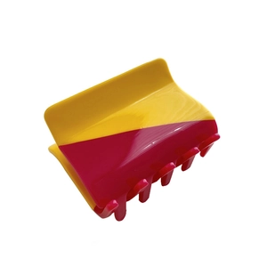 Minimalist geometric claw clip in two-tone yellow and rose red acetate resin