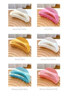 Detailed grid view of glossy colorful acetate hair claws in six different vibrant shades