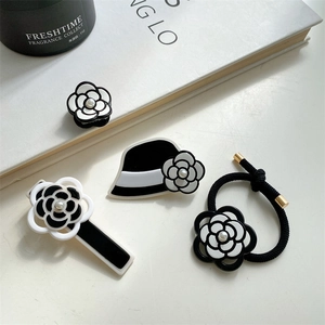 French retro camellia hair accessory set with black and white floral clips and pearls