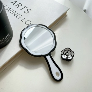 Elegant French style camellia hand mirror and hair clip set in classic black and white