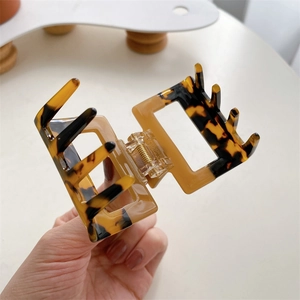 Minimalist square tortoiseshell acetate hair claw clip with a stylish geometric design