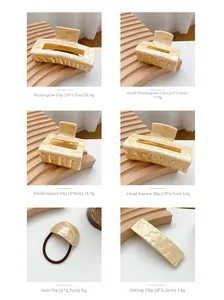 Set of cream marble acetate hair claws and clips in various sizes for stylish hair styling