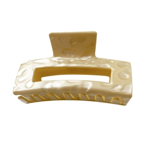 Elegant cream marble acetate rectangular hair claw clip with cutout design and secure grip