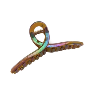 Extra large 13cm iridescent resin hair claw clip with elegant twisted amber design