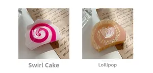 Detail view of acetate hair claws in cake roll and lollipop patterns with soft lighting