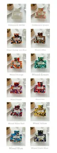 French vintage style rectangular acetate hair claws in twelve marble pattern colors