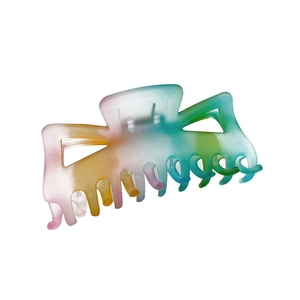 Matte gradient resin shark hair claw clip in pastel rainbow colors on white background
