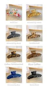 Detailed view of rhinestone bear hair claws in eight different patterns and colors