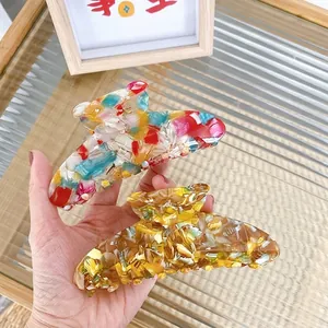 Elegant acetate rhinestone bear hair claw clips in colorful stone and amber marble patterns