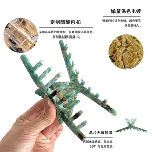 Green marble acetate hair claw clip with gold spring and multi-tooth grip for women