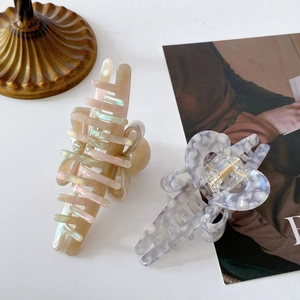Elegant large acetic acid bow hair claw clips in beige and blue marble finish