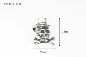 Detailed view of hip hop skull pendant with size specs 35mm height and 15.9g weight