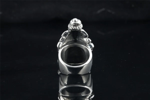 Close-up of polished inner band and thick relief texture on vintage steel ring