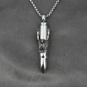 Polished titanium steel bullet pendant necklace featuring a detailed eagle engraving and box chain