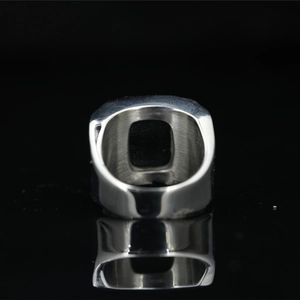Men's titanium steel ring with black gemstone and silver brushed texture finish