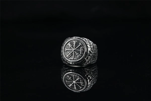 Detailed close-up of a vintage Viking Vegvisir compass ring with antique silver finish
