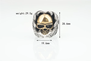 Macro detail of punk skull ring showing dimensions 28.6mm height and 29.5g weight info