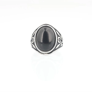 Vintage Mayan style stainless steel ring with black oval stone and floral engravings