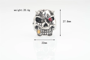 Detail view of retro skull ring with red zircon eye, 27.8mm height and 20.6g weight