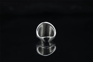Macro detail of men's square ring showing mirror finish and brushed inner band texture
