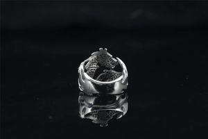 Macro shot of S925 sterling silver dragon ring with detailed scales and relief craft
