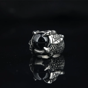 Retro punk dragon claw ring with black gemstone and scales in vintage steel finish