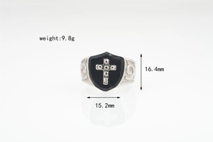 Macro detail of gothic punk shield ring with cross pattern and dimensions measurement