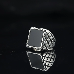 Vintage silver men's ring with square black stone and diamond-pattern engraving