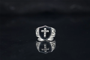 Detailed view of Gothic punk shield ring with cross engraving and black enamel inlay