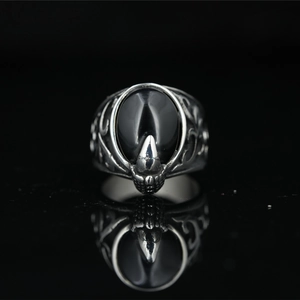 Retro punk style stainless steel ring with large oval black gemstone and gothic engraving