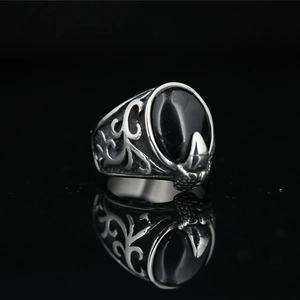 Vintage stainless steel ring with black oval onyx stone and eagle claw details