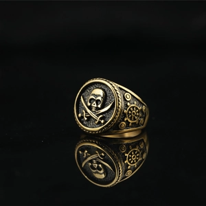 Vintage gold pirate skull and cross swords signet ring in punk stainless steel finish