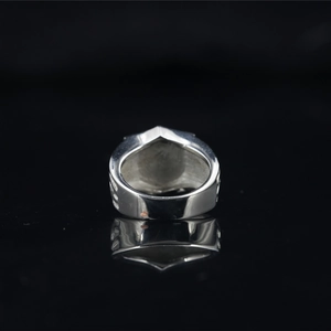 Polished wide band titanium steel ring for men featuring a reflective mirror finish