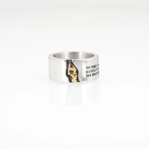 Gothic hip-hop titanium steel ring featuring silver band and golden skull inlay
