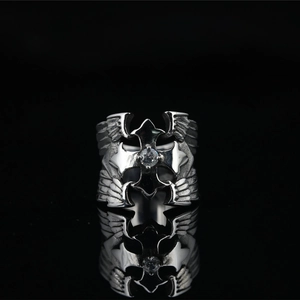Gothic punk titanium steel ring with silver cross, wings, and clear gemstone centerpiece