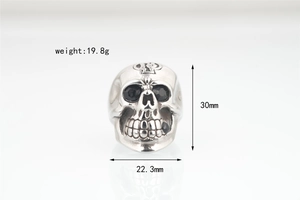 Detailed view of skull ring showing 19.8g weight and 30mm height with black stone inlay
