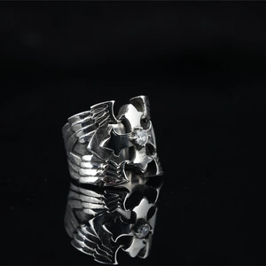 Gothic punk style silver titanium steel cross wing ring with center sparkling zircon stone